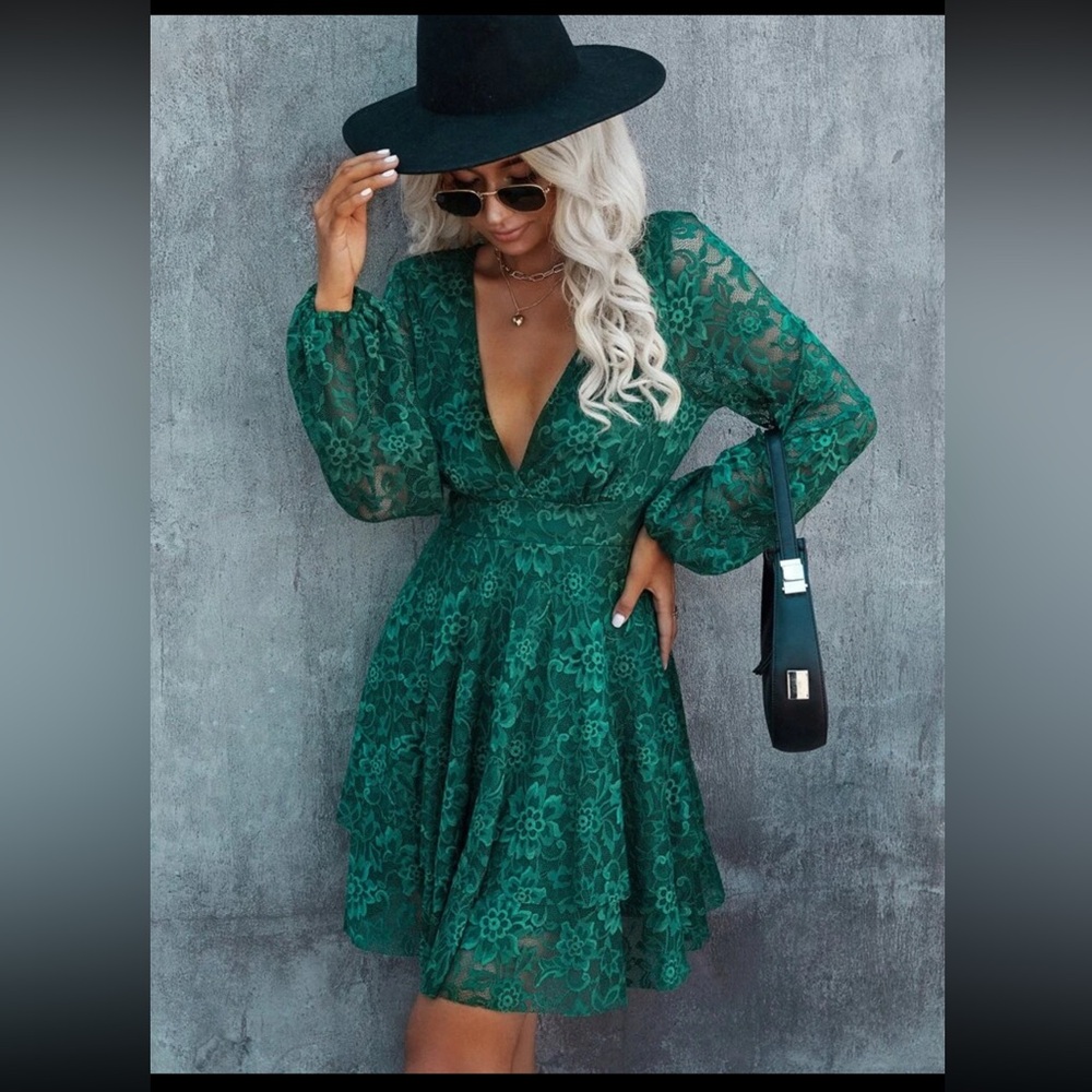 Deep v neck lantern sleeve tie back lace dress